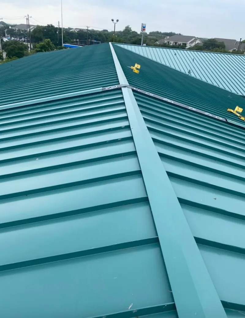 Green commercial metal roof ridge and valley for Metal Roof Repair in Fort Lewis