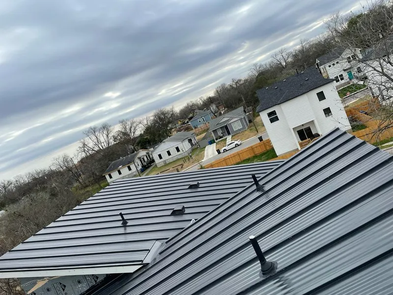 Standing seam metal roof panels with vents for Skylight Repair in Fort Lewis